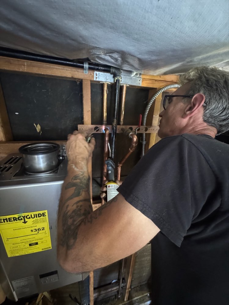 Ivan installing a tankless water heater